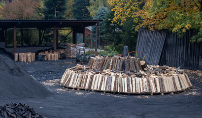 Charcoal pile prepared for churning
