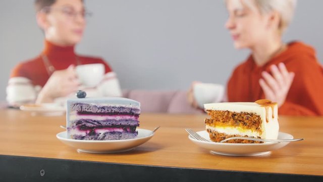 Delicious pieces of cake are standing on the table