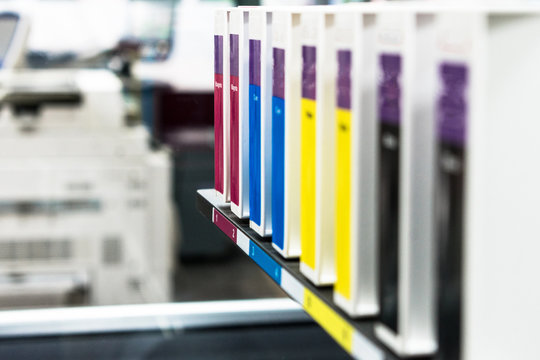 Close detail of ink cartridges in plotter for printing