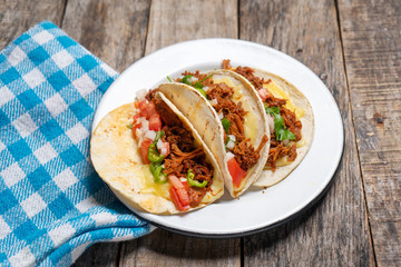 Mexican quesadillas with shredded pork also called 