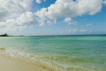 Amazing beauty white sand beach of Aruba Island.Turquoise sea water and blue sky. Beautiful background.