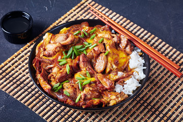 close-up of Oyakodon in a black bowl