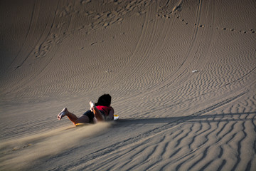 sandboard in huacachina