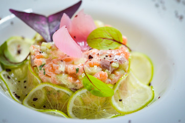 fresh salmon tartar with lime slices