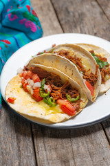 Mexican quesadillas with shredded pork also called 