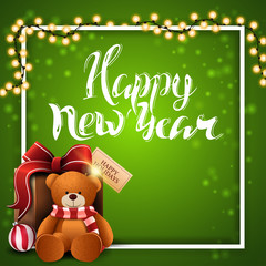Fototapeta na wymiar Happy New Year, square green postcard with white frame, garland and present with Teddy bear