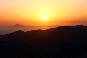 The orange sunset and the hills