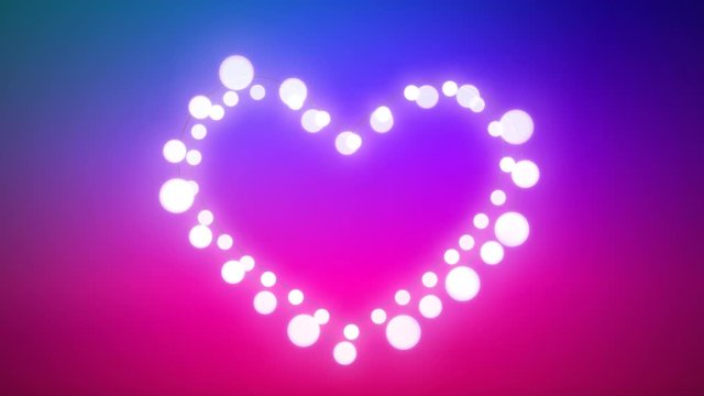 Glowing heart of fairy lights on purple background
