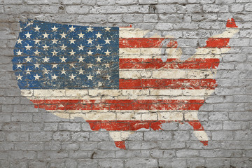 Flag map of USA painted on brick wall
