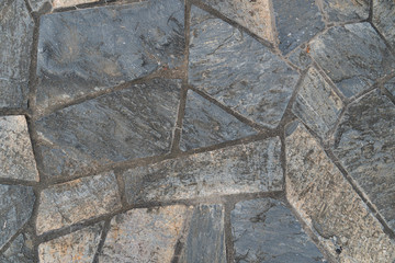 Tiles that are assembled into flooring for background and textured.