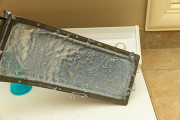 Dirty lint trap from clothes dryer