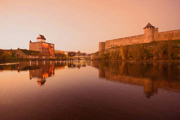 Fototapeta premium October twilight on the border Narva river. The border of Estonia and Russia