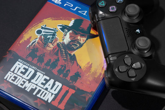 BANGKOK,THAILAND-NOVEMBER 26:  The New Red Dead Redemption 2 game with  ps4 Joystick on ps4 Console