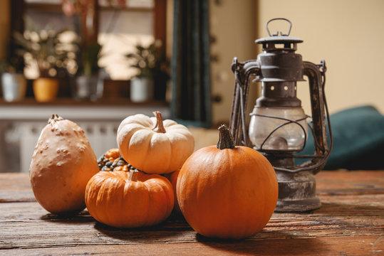 Orange pumkins on wood tabele, the halloween symbol.