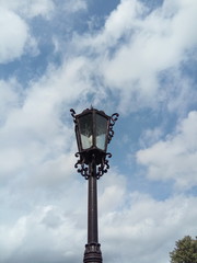 Fototapeta na wymiar street lamp in front of blue sky