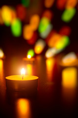 Christmas Candles flame light romantic decoration in defocused lights