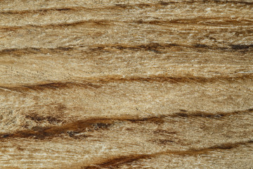 Wooden background texture. Brown scratched wooden cutting board.