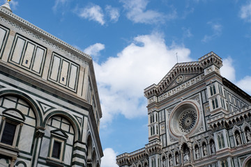 Florence's Santa Maria del Fiore, the Baptistery, blue sky and cloud.