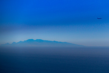 Fototapeta na wymiar Fuerteventura island silhouette from Gran Canaria