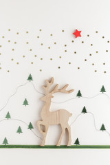 Christmas composition. Reindeer fir star top view background with copy space for your text. Flat lay.