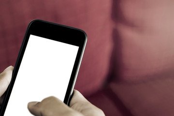 hand holding smart phone with blank screen.