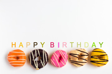 Donuts Set on White Background. You get different type of donuts. Birthday concept.
