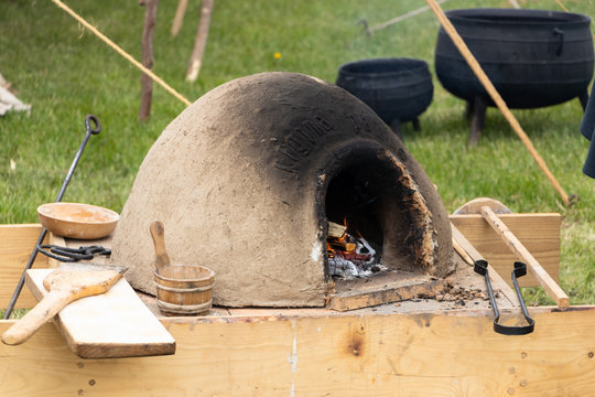 Traditional wood fired oven for bread baking at a medieval fare. Script in latin:Regina panis. translates as: Queen of the bread