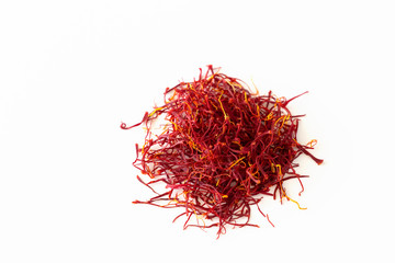Fototapeta premium Dried saffron spice isolate on white background. Aroma spice.