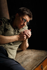 Portrait of man smoking cigarette