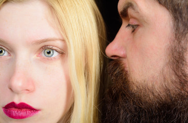 Fashionable couple. Beautiful couple in love. Closeup portrait of beautiful young couple. Romantic beautiful woman and handsome man closeup. Elegant couple in tender passion. Sensual relationship.