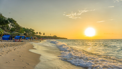 beach at sunset in baru island in cartagena colombia - obrazy, fototapety, plakaty