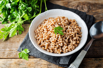 Barley porridge decorated with parsley leaves