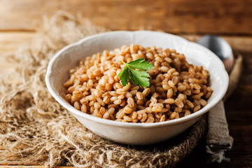 Barley porridge decorated with parsley leaves