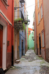 Fototapeta na wymiar Narrow and coloured alleys in Sardinia