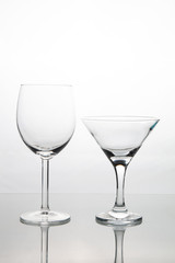 glasses for martini and red wine on a white background