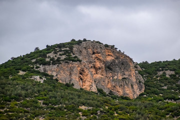 Fototapeta na wymiar Caves in the limestone mountains. Void in rock mountain.
