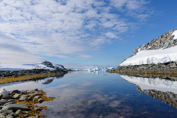 Antarctic landscape with iceberg