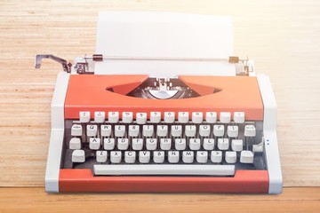 Old typewriter with paper  on background