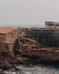 garage door located on the seashore to better preserve the boat and its tools