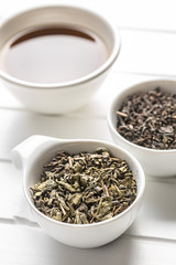 Dried green tea leaves.