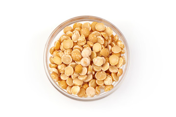Bowl of dry peas, isolated on white background