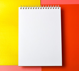 watercolor sketchbook on a colored background