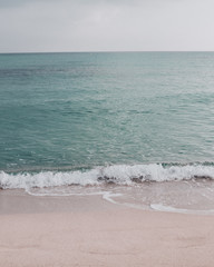 Shore on the beach where the tour ends the waves of the Mediterranean Sea