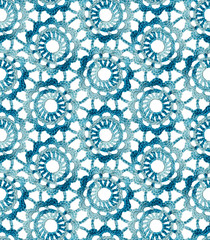 Seamless Irish lace pattern. Crochet. White and blue melange yarn. Knitted flowers on a mesh of air loops.
