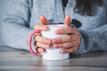  woman hand cup of coffee