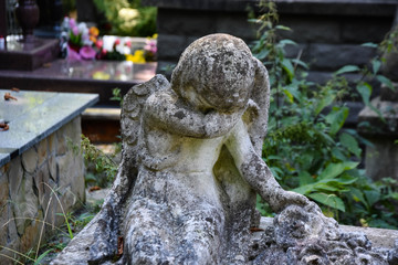 Angel statue in cemetery. Religious beliefs
