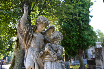 Angel statue in cemetery. Religious beliefs
