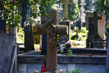 Cross and tombstone on an old cemetery.  