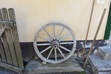 Fototapeta na wymiar old wooden wagon wheel handmade