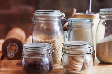 Transparent cereal containers. Kitchen accessory сloseup. Shallow depth of field.
